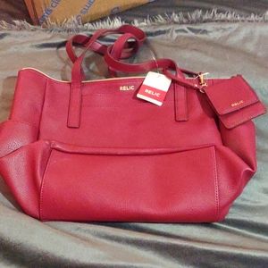 Brand New tags included red relic purse